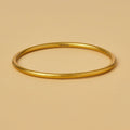 Virtuous Circle Gold Tone Skinny Bangle