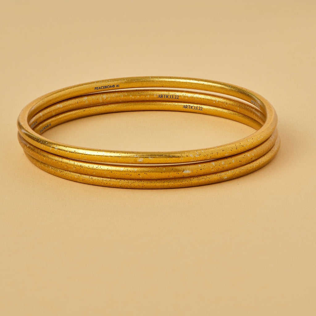 VIRTUOUS CIRCLE GOLD TONE SKINNY BANGLE